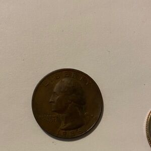 1986 P missing clad filled in mint mark copper quarter